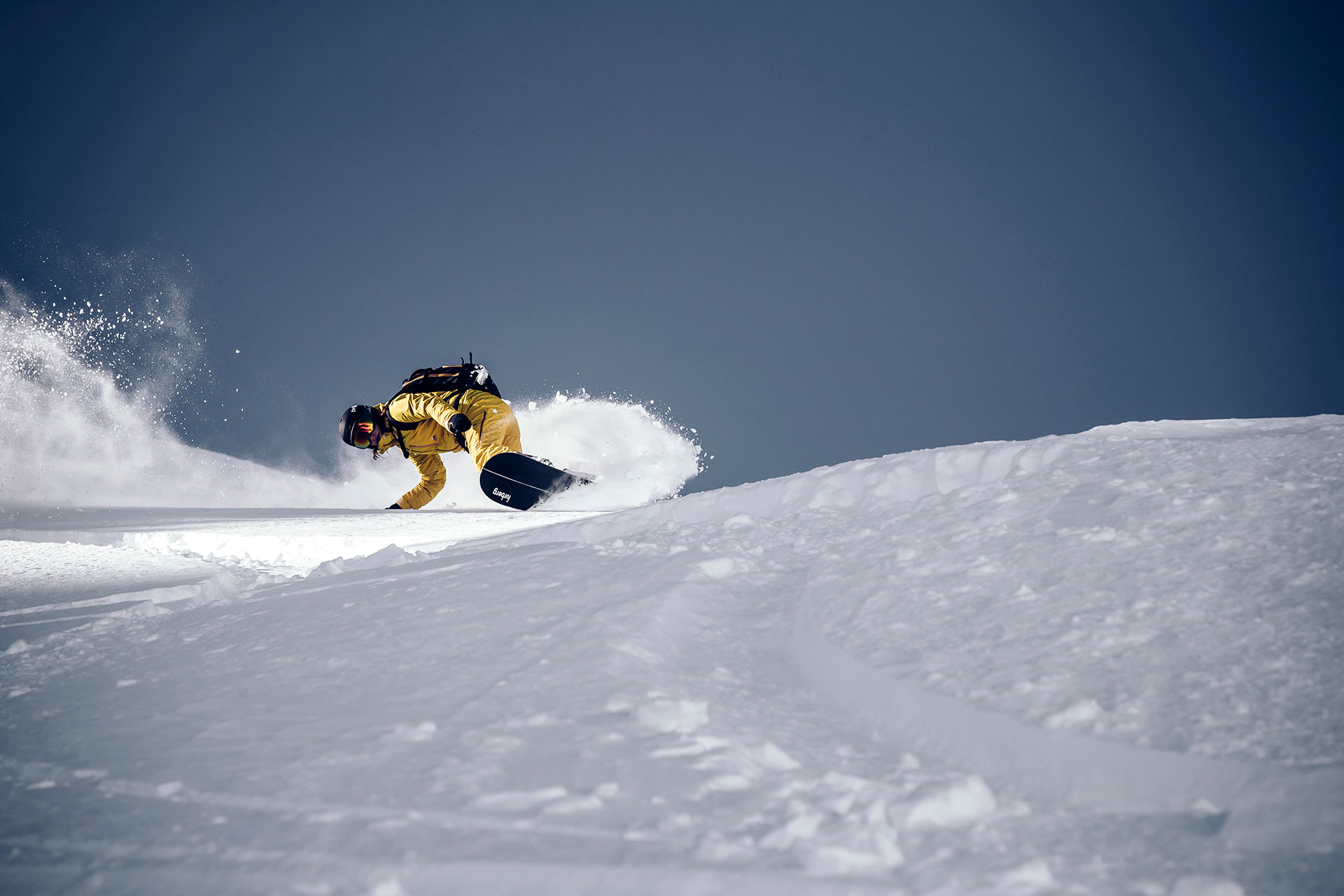 Snowboard Fotograf Aktion Freeride Powder Tiefschnee Zürich Schweiz Ski Outdoor